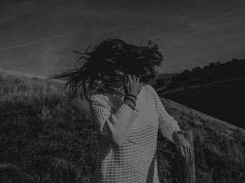 Grayscale Photography of Woman Flipping Hair
