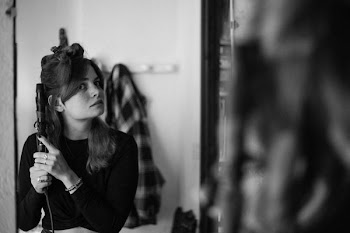 grayscale photography of woman in long-sleeved top