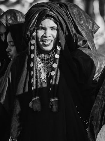 Grayscale Photography of Woman Near Outdoor