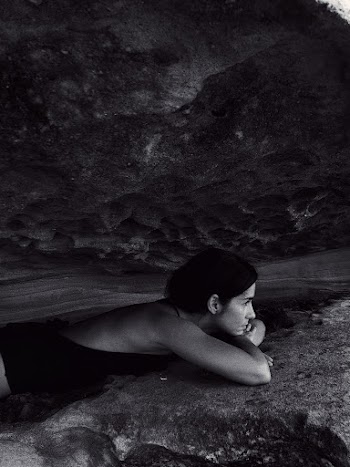 Grayscale Photography of Woman Proning on Surface
