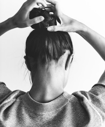 Grayscale Photography Of Woman Raising Both Hands