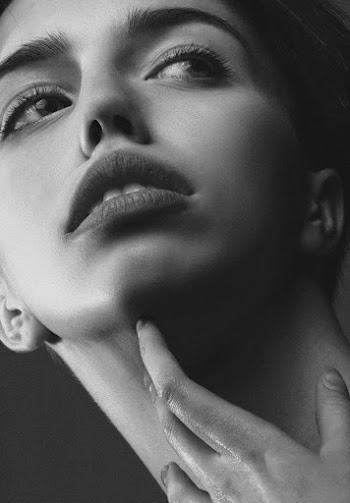 Grayscale Photography of Woman Rubbing Her Neck