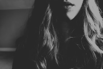grayscale photography of woman's face
