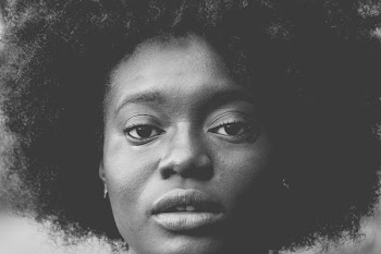 grayscale photography of woman's face