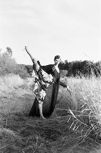 Grayscale Photography Of Woman Standing With One Leg
