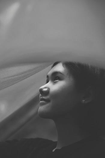 Grayscale Photography of Woman Under Cloth
