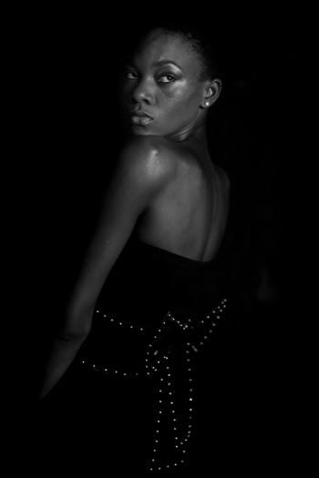 Grayscale Photography of Woman Wearing Bow-themed Dress