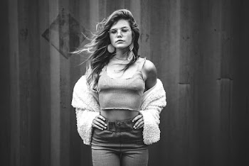 Grayscale Photography of Woman Wearing Fur Coat