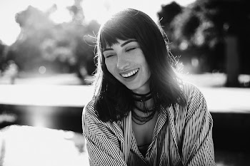 Grayscale Photography of Woman Wearing Stripe Shirt and Necklace