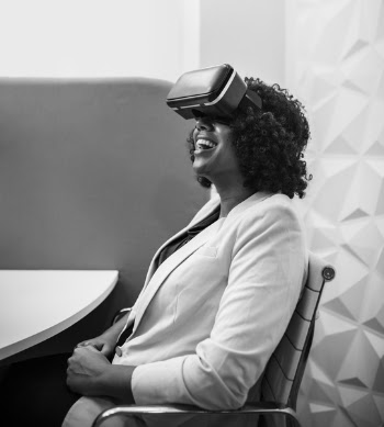 Grayscale Photography of Woman Wearing Virtual Reality Headset