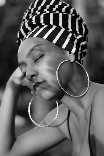 Grayscale Photography of Woman With Big Earrings