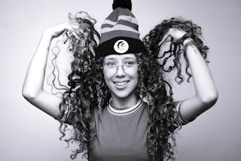 Grayscale Photography of Woman With Curly Long Hair Wearing A Beanie