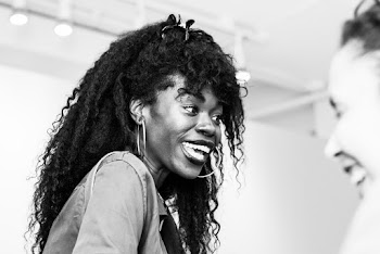 Grayscale Photography of Woman With Long Curly Black Hair