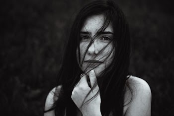 grayscale photography of woman with long hair