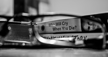 Grayscale Photography View Through Eyeglasses Who Will Cry When You Die? Labeled Book