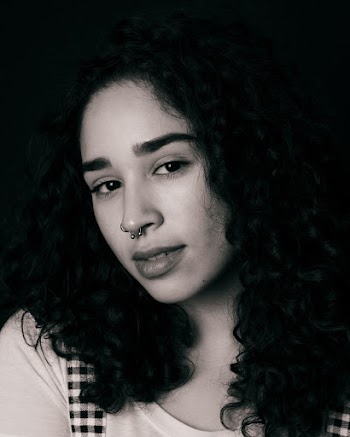 Grayscale Portrait Photo of Beautiful Woman Posing