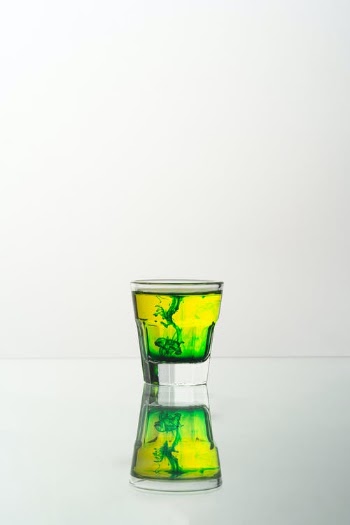 Green and Clear Drinking Glass With Water · Free Stock Photo