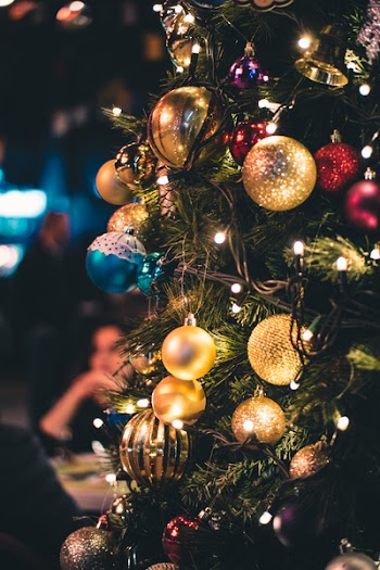 Green and Gold-colored Lighted Christmas Tree