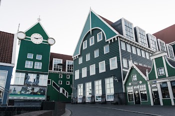 Green and White Concrete Building