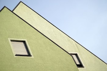 green and white painted houses