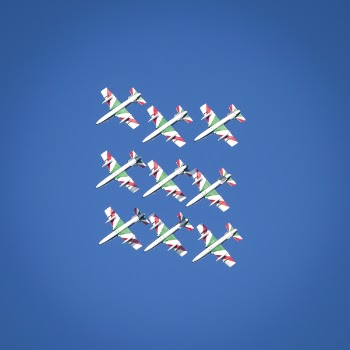 Green-and-white Show Planes on Sky