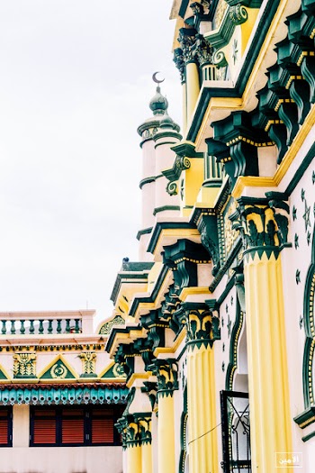 Green and Yellow Painted Building