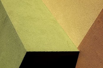 green, beige, and brown textile