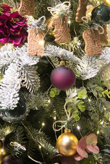 Green Christmas Tree Filled With Decors and Bauble