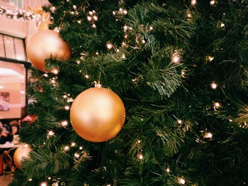 Green Christmas Tree With Three Round Gold Ornaments