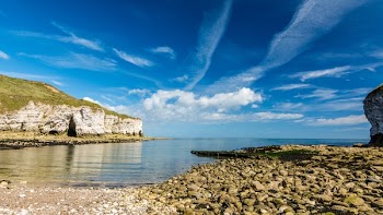 Green Cliff Beside Sea