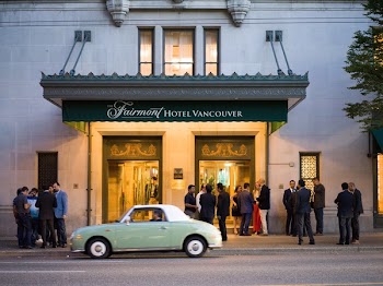 Green Coupe In Front Of Fairmont Hotel Vancouver