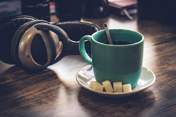 Green Cup Filled With Coffee