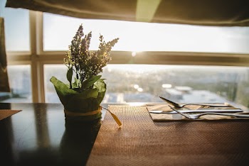 Green Flower With Pot on Table