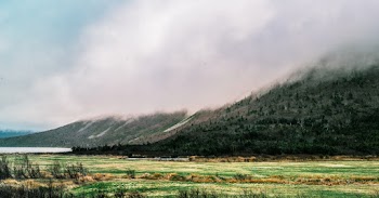 Green Grass Near Hill