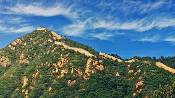 Green Hills Under Alto Cirrus Clouds