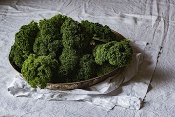 green leaf plants in gold-colored tray