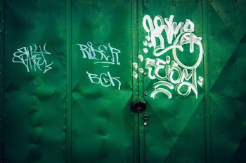 green metal gate closed