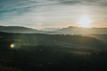Green Mountain Under Blue Sky during Golden Hour