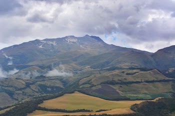 green mountain under cloudy skey