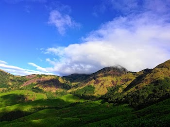 Green Mountain Under Cloudy Sky