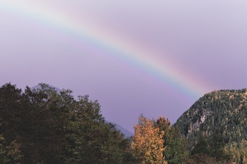 Green Mountain Under Rainbow