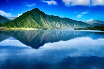 Green Mountain With Light Reflection