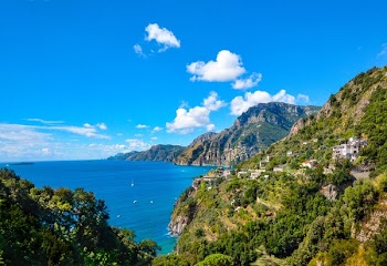 Green Mountains Beside Body of Water