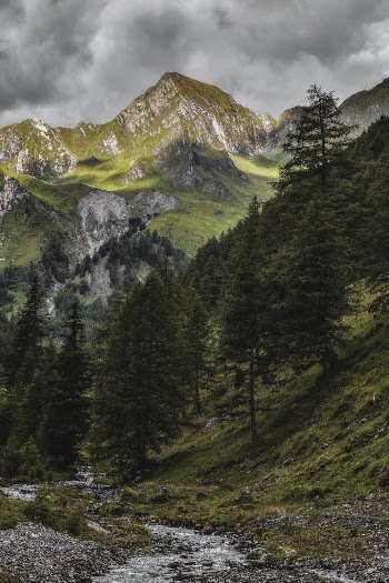 Green Mountains Under Cloudy Sky