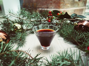 Green Pine Tree Leaves Wreathe With Teacup in the Middle