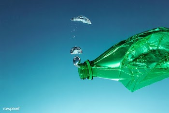 Green plastic bottle polluting the ocean | Free  photo - 2319409