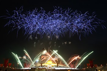 Green, Red, and Blue Fireworks at Night