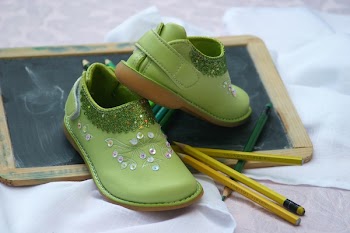 Green Slip on Shoes Near Yellow and Green Pencil
