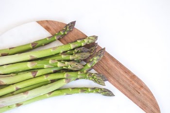 Green Stems on Brown and White Surface