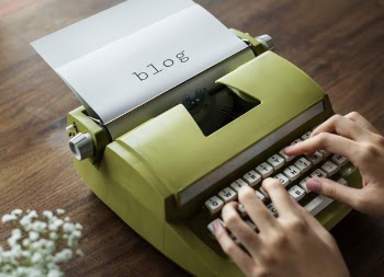 Green Typewriter Written Blog
